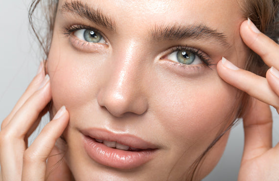 Woman with clean smooths skin after microneedling treatment