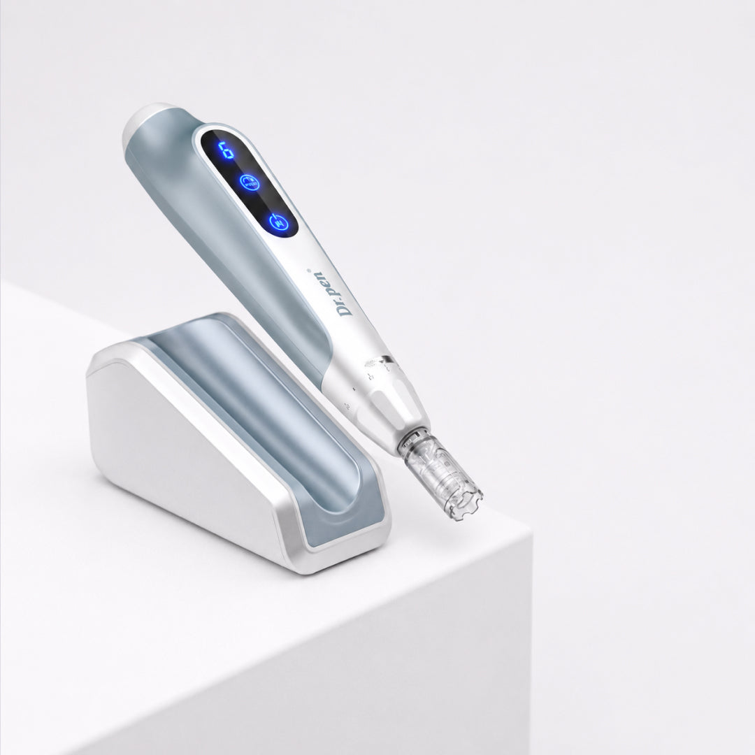 Dr. Pen MC9 Ultima PRO Microneedling Pen device on charging base at the edge of a while platform