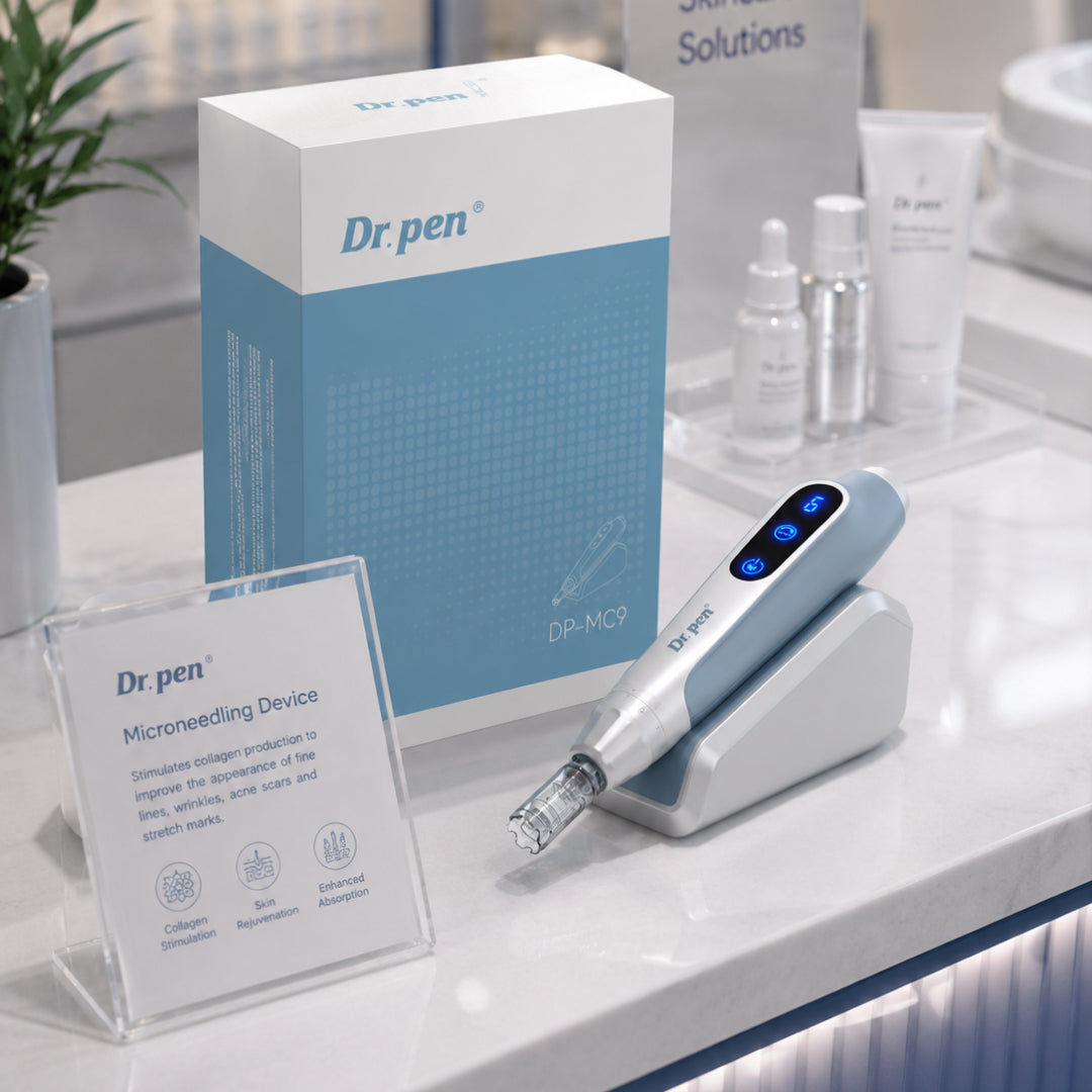 Dr. Pen MC9 Ultima PRO microneedling device displayed with induction charging stand, product packaging, and skincare products in a professional clinic setting.